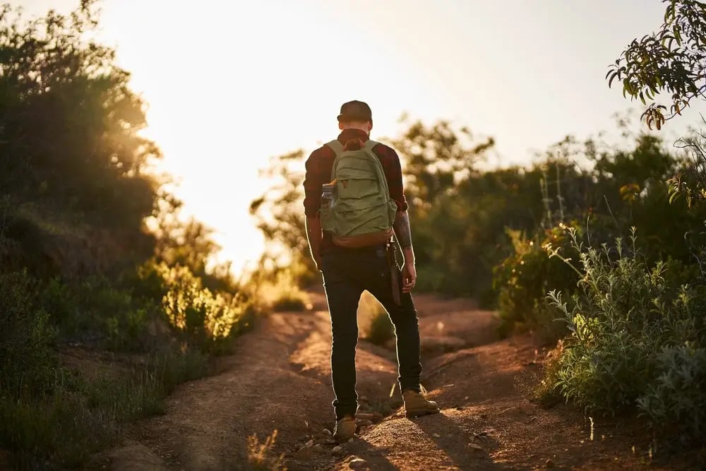 male-millennial-hiker-trekking-up-trail-in-souther-2023-11-27-05-28-35-utc